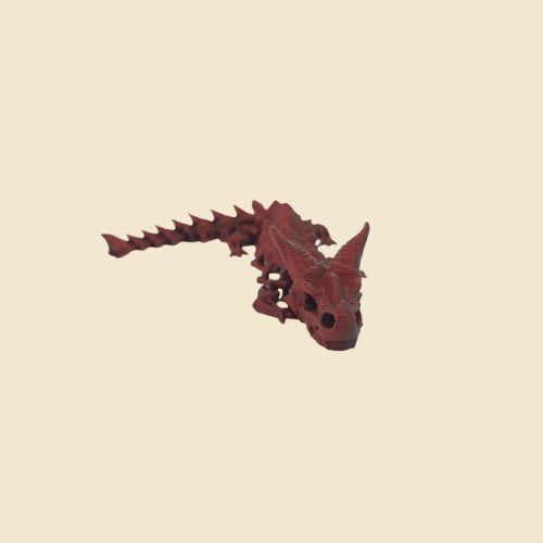 Rot-schwarzer Ashborn-Drache mit ausgestrecktem Körper.