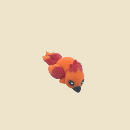 Orange-rote Phönix-Miniatur mit großen Augen.