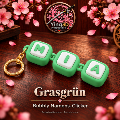 Bubbly Namens-Clicker in Grasgrün mit mattweißen Tasten und farbigen Buchstaben – Farbvisualisierung mit Beispielname MIA